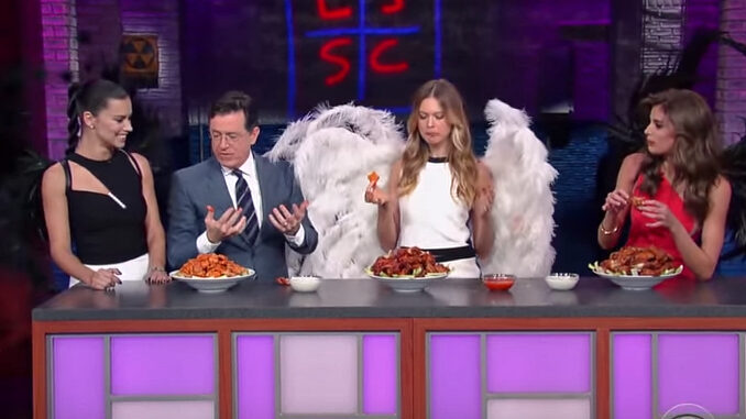 Victoria’s Secret Angels wings with Stephen Colbert