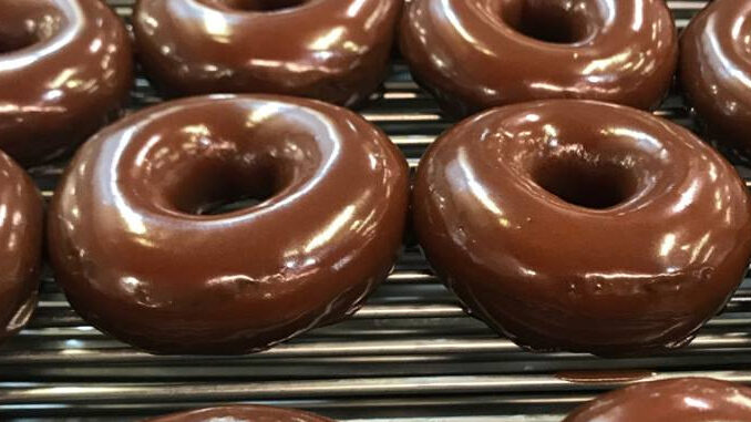 Buy Any Dozen, Get A $2 Chocolate Glazed Dozen At Krispy Kreme On August 2, 2019