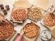 Domino's Offers 50% Off All Menu-Priced Pizzas Ordered Online Through August 21, 2022