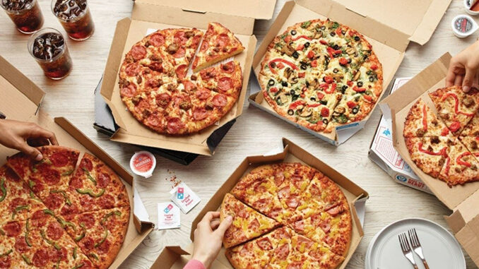 Domino's Offers 50% Off Menu-Priced Pizzas Ordered Online Through March 26, 2023