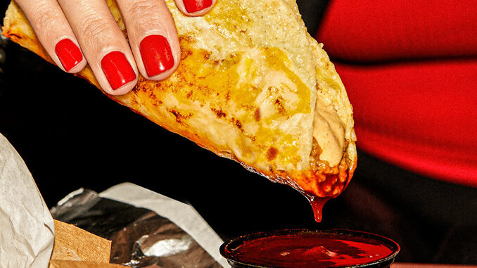 Taco Bell Introduces New Grilled Cheese Dipping Taco Made With New Slow-Braised Shredded Beef