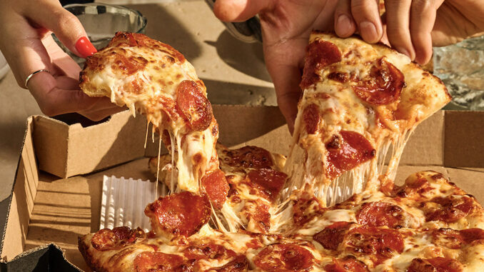 Domino's Offers 50% Off All Menu-Priced Pizzas Ordered Online Through March 24, 2024